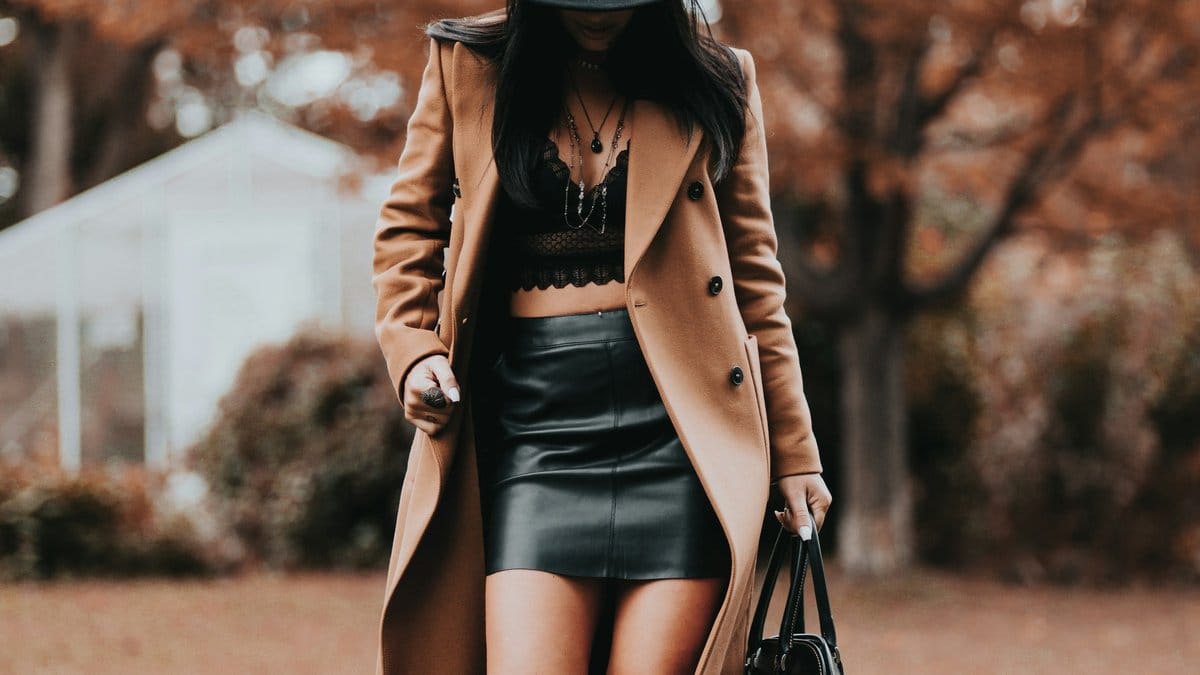The third piece in action — a structured coat pulls the whole look together