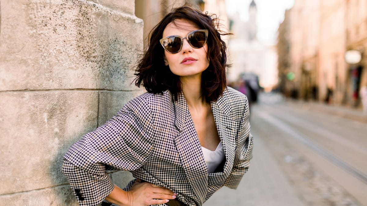 The statement piece formula — a patterned blazer against a neutral base